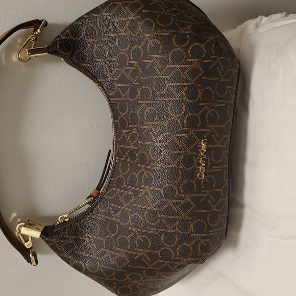Calvin Klein Dark Brown CK Monogram Shoulder Bag. This Original Dark Brown.